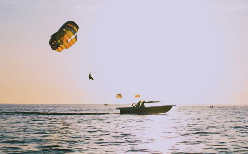 Parasailing and boat.